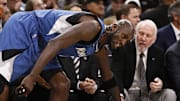Dec 28, 2015; San Antonio, TX, USA; Minnesota Timberwolves power forward Kevin Garnett (21) shakes hands with San Antonio Spurs head coach Gregg Popovich during the first half at AT&T Center. Mandatory Credit: Soobum Im-Imagn Images