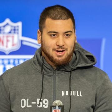 Mar 2, 2024; Indianapolis, IN, USA; Kansas offensive lineman Dominick Puni (OL59) talks to the media during the 2024 NFL Combine at Lucas Oil Stadium. Mandatory Credit: Trevor Ruszkowski-USA TODAY Sports