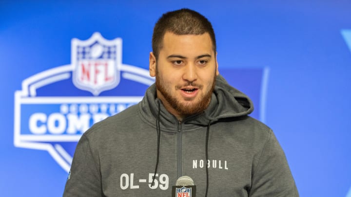 Mar 2, 2024; Indianapolis, IN, USA; Kansas offensive lineman Dominick Puni (OL59) talks to the media during the 2024 NFL Combine at Lucas Oil Stadium. Mandatory Credit: Trevor Ruszkowski-USA TODAY Sports