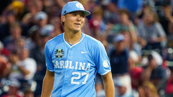 Jun 12, 2026; Omaha, NE, USA; North Carolina Tar Heels pitcher Caden Glauber (27) reacts after defeating the Mississippi Rebels at Charles Schwab Field. Mandatory Credit: Dylan Widger-Imagn Images