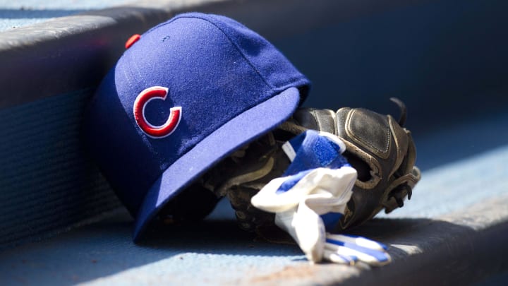 Apr 10, 2011; Milwaukee, WI, USA; Chicago Cubs hat and glove