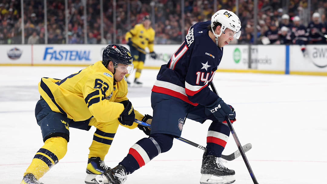 Jesper Bratt (Team Sweden #63) battling alongside Brock Faber (Team USA #14)