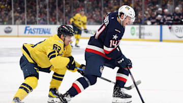Jesper Bratt (Team Sweden #63) battling alongside Brock Faber (Team USA #14)