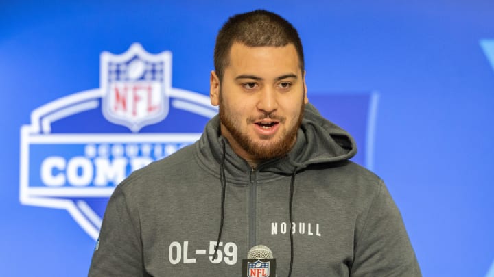 Mar 2, 2024; Indianapolis, IN, USA; Kansas offensive lineman Dominick Puni (OL59) talks to the media during the 2024 NFL Combine at Lucas Oil Stadium. Mandatory Credit: Trevor Ruszkowski-USA TODAY Sports