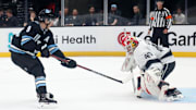Sep 23, 2024; Salt Lake City, Utah, USA; Utah Hockey Club forward Clayton Keller (9) shoots against Los Angeles Kings goaltender Carter George} (40) during a shootout at Delta Center. Mandatory Credit: Rob Gray-Imagn Images
