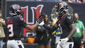 Oct 27, 2024; Houston, Texas, USA; Houston Texans wide receiver Tank Dell (3) celebrates with wide receiver Stefon Diggs (1) after scoring a touchdown during the second quarter against the Indianapolis Colts at NRG Stadium.