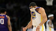 Apr 8, 2025; Phoenix, Arizona, USA; Golden State Warriors guard Stephen Curry (30) reacts against the Phoenix Suns during the first half at Footprint Center. Mandatory Credit: Mark J. Rebilas-Imagn Images