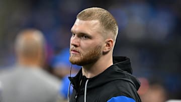 Jan 18, 2025; Detroit, Michigan, USA; Detroit Lions defensive lineman Aidan Hutchinson (97) looks on from the bench during the fourth quarter against the Washington Commanders in a 2025 NFC divisional round game at Ford Field. Mandatory Credit: Lon Horwedel-Imagn Images