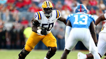 Sep 30, 2023; Oxford, Mississippi, USA; LSU Tigers offensive linemen Emery Jones Jr. (50) blocks during the first half against the Mississippi Rebels at Vaught-Hemingway Stadium. Mandatory Credit: Petre Thomas-Imagn Images