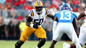 Sep 30, 2023; Oxford, Mississippi, USA; LSU Tigers offensive linemen Emery Jones Jr. (50) blocks during the first half against the Mississippi Rebels at Vaught-Hemingway Stadium. Mandatory Credit: Petre Thomas-USA TODAY Sports