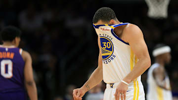 Apr 8, 2025; Phoenix, Arizona, USA; Golden State Warriors guard Stephen Curry (30) reacts against the Phoenix Suns during the first half at Footprint Center. Mandatory Credit: Mark J. Rebilas-Imagn Images