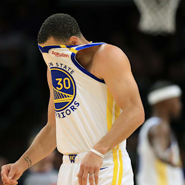 Apr 8, 2025; Phoenix, Arizona, USA; Golden State Warriors guard Stephen Curry (30) reacts against the Phoenix Suns during the first half at Footprint Center. Mandatory Credit: Mark J. Rebilas-Imagn Images