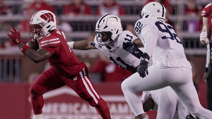 Wisconsin running back Tawee Walker (3) is chased by Penn State defensive end Abdul Carter (11) during the first quarter of their game Saturday, October 26, 2024 at Camp Randall Stadium in Madison, Wisconsin.
