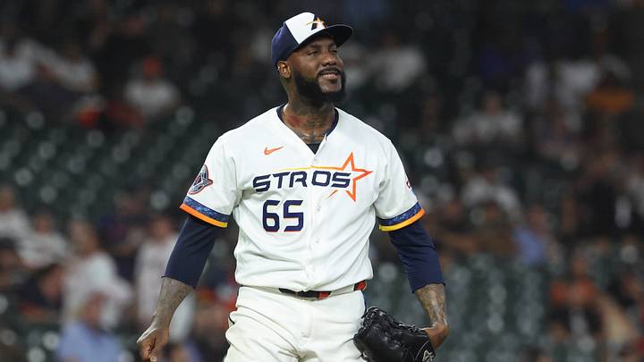 Aug 31, 2026; Houston, Texas, USA; Houston Astros pitcher Enyel de Los Santos (65) reacts after issuing a walk during the sixth inning against the Chicago White Sox at Daikin Park. Mandatory Credit: Troy Taormina-Imagn Images