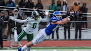 Novi Detroit Catholic Central's Jack Janda stretches out but fails to pull in the pass while covered by Detroit Cass Tech's Lamont Wilcoxson in the fourth quarter during the MHSAA Division 1 semifinals at Troy Athens High School on Saturday, Nov. 23, 2024.