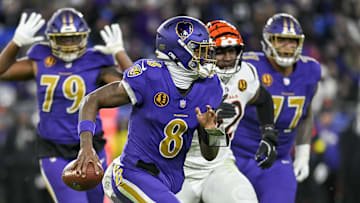 Nov 27, 2025; Baltimore, Maryland, USA; Baltimore Ravens quarterback Lamar Jackson (8) scrambles during the game against the Cincinnati Bengals  at M&T Bank Stadium. Mandatory Credit: Tommy Gilligan-Imagn Images
