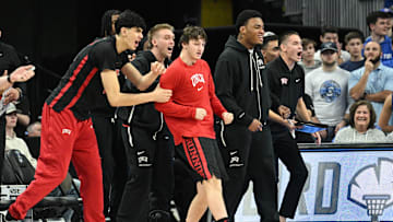 The UNLV Rebels bench cheer action against the Creighton Bluejays in the first half at CHI Health Center Omaha. 