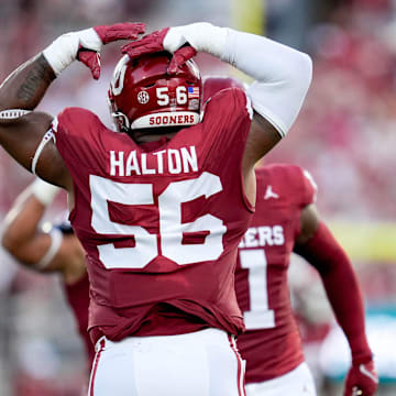 Oklahoma defensive lineman Gracen Halton (56) celebrates after sacking Temple quarterback Forrest Brock (11)