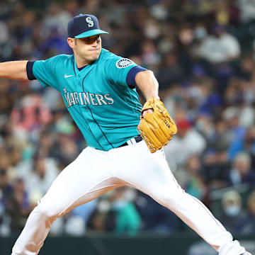 Seattle Mariners relief pitcher Casey Sadler (65) pitches against the Los Angeles Angels during the seventh inning at T-Mobile Park in 2021.