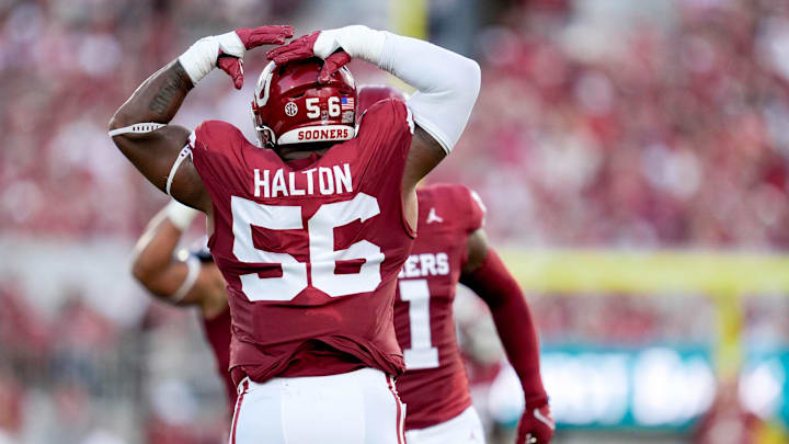 Oklahoma defensive lineman Gracen Halton (56) celebrates after sacking Temple quarterback Forrest Brock (11)