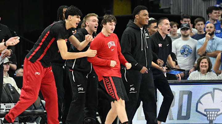 The UNLV Rebels bench cheer action against the Creighton Bluejays in the first half at CHI Health Center Omaha. The UNLV Rebels bench cheer action against the Creighton Bluejays in the first half at CHI Health Center Omaha.