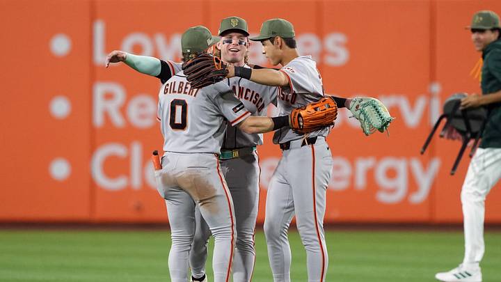 May 16, 2026; West Sacramento, California, USA; San Francisco Giants center fielder Harrison Bader (center) celebrates with left fielder Drew Gilbert (0) and right fielder Jung Hoo Lee (center right) after defeating the Athletics at Sutter Health Park. Mandatory Credit: Darren Yamashita-Imagn Images