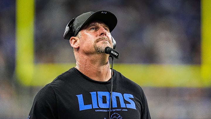 Detroit Lions head coach Dan Campbell watches a replay against Houston Texans during the first half at Ford Field in Detroit on Saturday, August 23, 2025.