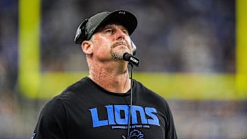 Detroit Lions head coach Dan Campbell watches a replay against Houston Texans during the first half at Ford Field in Detroit on Saturday, August 23, 2025.