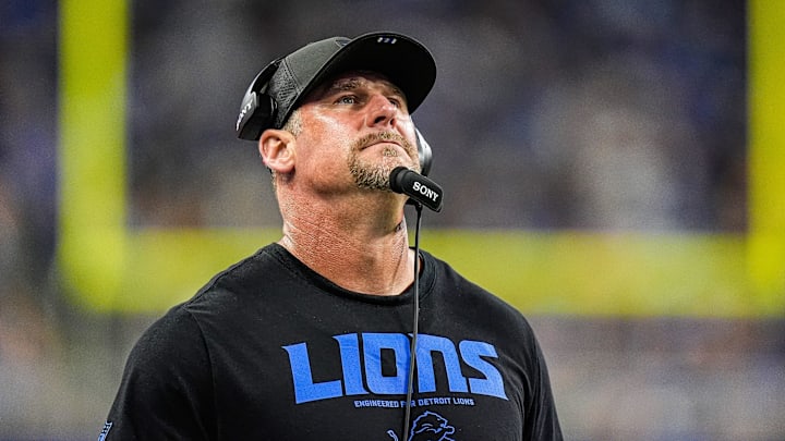 Detroit Lions head coach Dan Campbell watches a replay against Houston Texans during the first half at Ford Field in Detroit on Saturday, August 23, 2025.