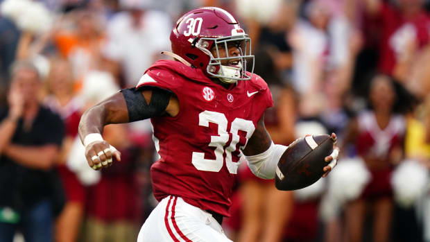 Alabama Crimson Tide linebacker Jihaad Campbell scores a turnover on defense during a college football game in the SEC.