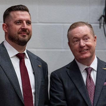 Florida State University’s new men’s basketball coach Luke Loucks stands with FSU Athletic Director Michael Alford before a press conference Monday, March 10, 2025.