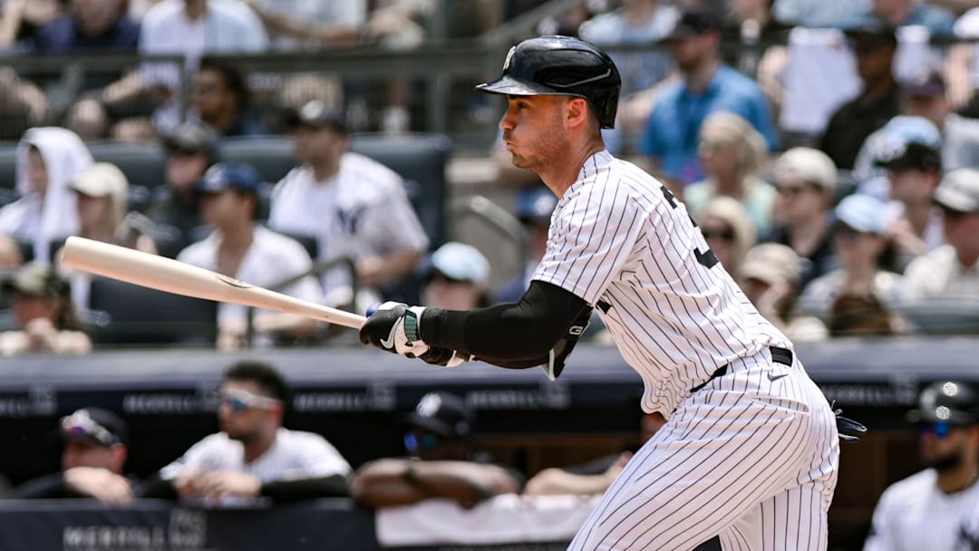 Jun 21, 2025; Bronx, New York, USA; New York Yankees outfielder Cody Bellinger (35) hits a single against the Baltimore Orioles during the first inning at Yankee Stadium. Mandatory Credit: John Jones-Imagn Images