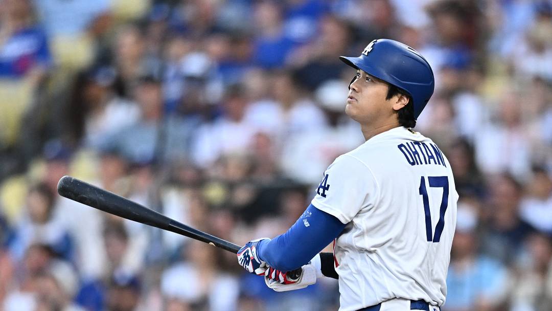 Jul 28, 2026; Los Angeles, California, USA; Los Angeles Dodgers two-way player Shohei Ohtani (17) hits a home run during the first inning against the Seattle Mariners  at Dodger Stadium. Mandatory Credit: William Liang-Imagn Images