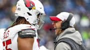 Nov 24, 2024; Seattle, Washington, USA; Arizona Cardinals head coach Jonathan Gannon talks with defensive tackle Dante Stills (55) during the second quarter against the Seattle Seahawks at Lumen Field. Mandatory Credit: Joe Nicholson-Imagn Images
