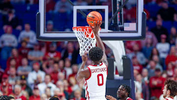 Oklahoma guard Le'Tre Darthard (0) jumps to shoot for two in the first half during an NCAA game against Arkansas in Tulsa on Dec. 2.