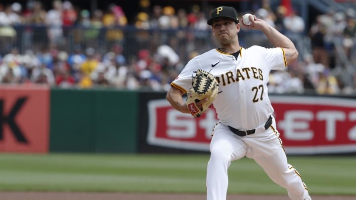 Jul 21, 2024; Pittsburgh, Pennsylvania, USA;  Pittsburgh Pirates starting pitcher Marco Gonzales (27) delivers a pitch against the Philadelphia Phillies during the first inning at PNC Park. Mandatory Credit: Charles LeClaire-USA TODAY Sports