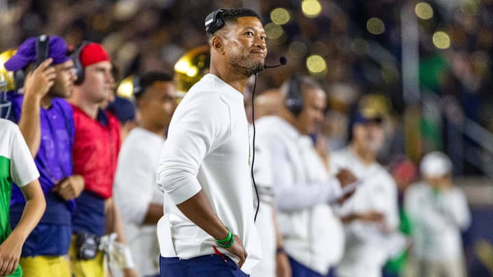 Sep 13, 2025; South Bend, Indiana, USA; Notre Dame Fighting Irish head coach Marcus Freeman looks at the scoreboard during the second half against the Texas A&M Aggies at Notre Dame Stadium. Mandatory Credit: Michael Caterina-Imagn Images