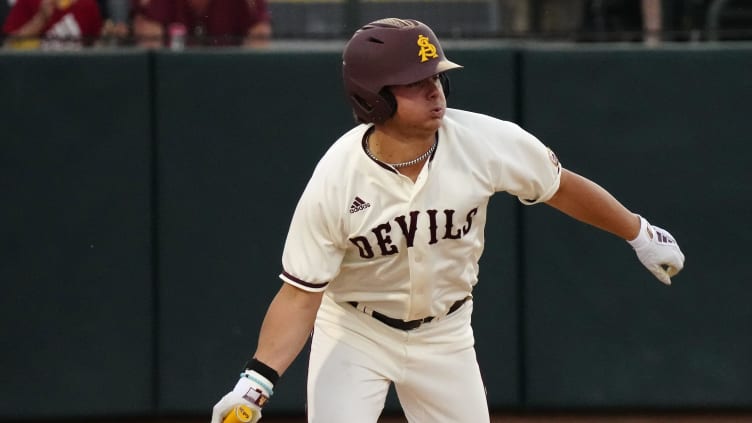 ASU outfielder Nick McLain hits the ball against Oregon State