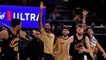 Jan 22, 2025; Houston, Texas, USA; Cleveland Cavaliers bench players react after a made basket by Cleveland Cavaliers forward Dean Wade (32) against the Houston Rockets during the fourth quarter at Toyota Center. Mandatory Credit: Erik Williams-Imagn Images