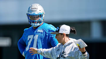 Detroit Lions offensive lineman Miles Frazier (71), left, listens as Director of Sports Science Jill Costanza talks during rookie mini camp at Meijer Performance Center in Allen Park on Friday, May 9, 2025.