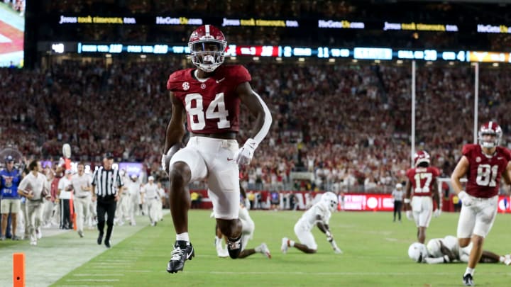 Sep 9, 2023; Tuscaloosa, Alabama, USA; Alabama Crimson Tide tight end Amari Niblack (84) leaps into the end zone with a touchdown at Bryant-Denny Stadium. Texas defeated Alabama 34-24.