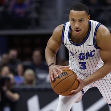 Oct 29, 2025; Detroit, Michigan, USA; Orlando Magic guard Desmond Bane (3) is defended by Detroit Pistons guard Ausar Thompson (9) in the first half at Little Caesars Arena. Mandatory Credit: Rick Osentoski-Imagn Images
