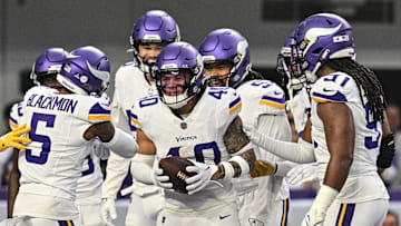 Dec 24, 2023; Minneapolis, Minnesota, USA; Minnesota Vikings linebacker Ivan Pace Jr. (40) and cornerback Mekhi Blackmon (5) react with teammates after a fumble recovery against the Detroit Lions during the game at U.S. Bank Stadium. Mandatory Credit: Jeffrey Becker-Imagn Images