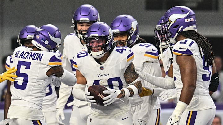 Dec 24, 2023; Minneapolis, Minnesota, USA; Minnesota Vikings linebacker Ivan Pace Jr. (40) and cornerback Mekhi Blackmon (5) react with teammates after a fumble recovery against the Detroit Lions during the game at U.S. Bank Stadium.  