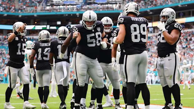 Nov 17, 2024; Miami Gardens, Florida, USA; Las Vegas Raiders tight end Brock Bowers (89) celebrates with guard Jackson Powers