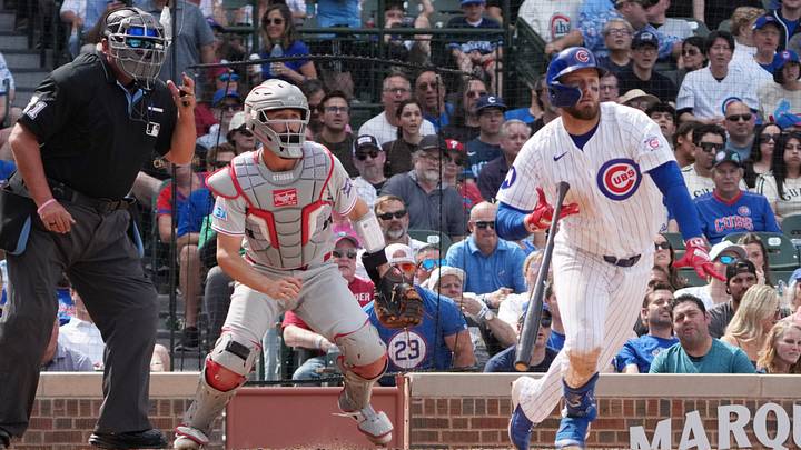 Chicago Cubs first baseman Michael Busch hits a sacrifice fly against the Philadelphia Phillies.