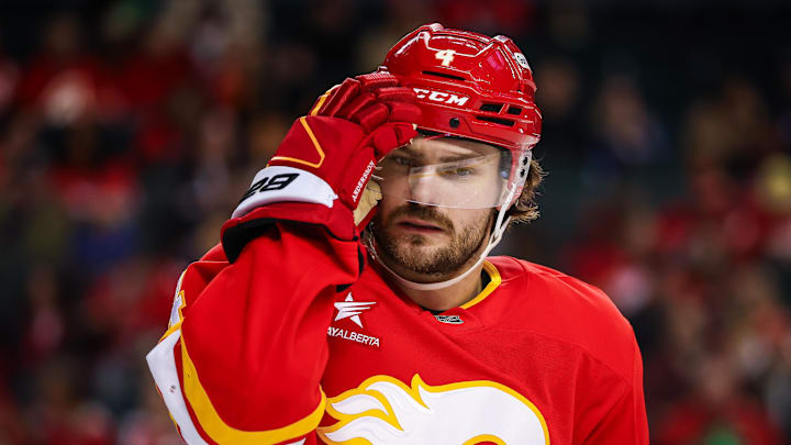 Mar 14, 2025; Calgary, Alberta, CAN; Calgary Flames defenseman Rasmus Andersson (4) reacts during the third period against the Colorado Avalanche at Scotiabank Saddledome. Mandatory Credit: Sergei Belski-Imagn Images Mar 14, 2025; Calgary, Alberta, CAN; Calgary Flames defenseman Rasmus Andersson (4) reacts during the third period against the Colorado Avalanche at Scotiabank Saddledome. Mandatory Credit: Sergei Belski-Imagn Images