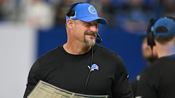 Nov 24, 2024; Indianapolis, Indiana, USA; Detroit Lions head football coach Dan Campbell smiles on the sidelines before the game against the Indianapolis Colts  at Lucas Oil Stadium. Mandatory Credit: Marc Lebryk-Imagn Images