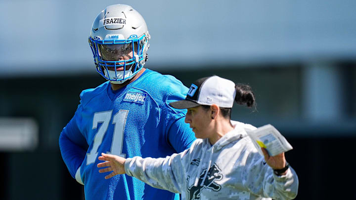 Detroit Lions offensive lineman Miles Frazier (71), left, listens as Director of Sports Science Jill Costanza talks during rookie mini camp at Meijer Performance Center in Allen Park on Friday, May 9, 2025.