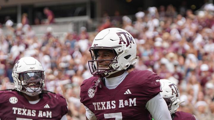 Sep 6, 2025; College Station, Texas, USA; Texas A&M Aggies offensive lineman Mark Nabou Jr. (54), Texas A&M Aggies wide receiver KC Concepcion (7) and Texas A&M Aggies tight end Theo Melin Öhrström (17) celebrate after a touchdown during the second half against the Utah State Aggies at Kyle Field. Mandatory Credit: Sean Thomas-Imagn Images